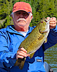 John With a Trophy Smallmouth Bass Fishing at Fireside Lodge
